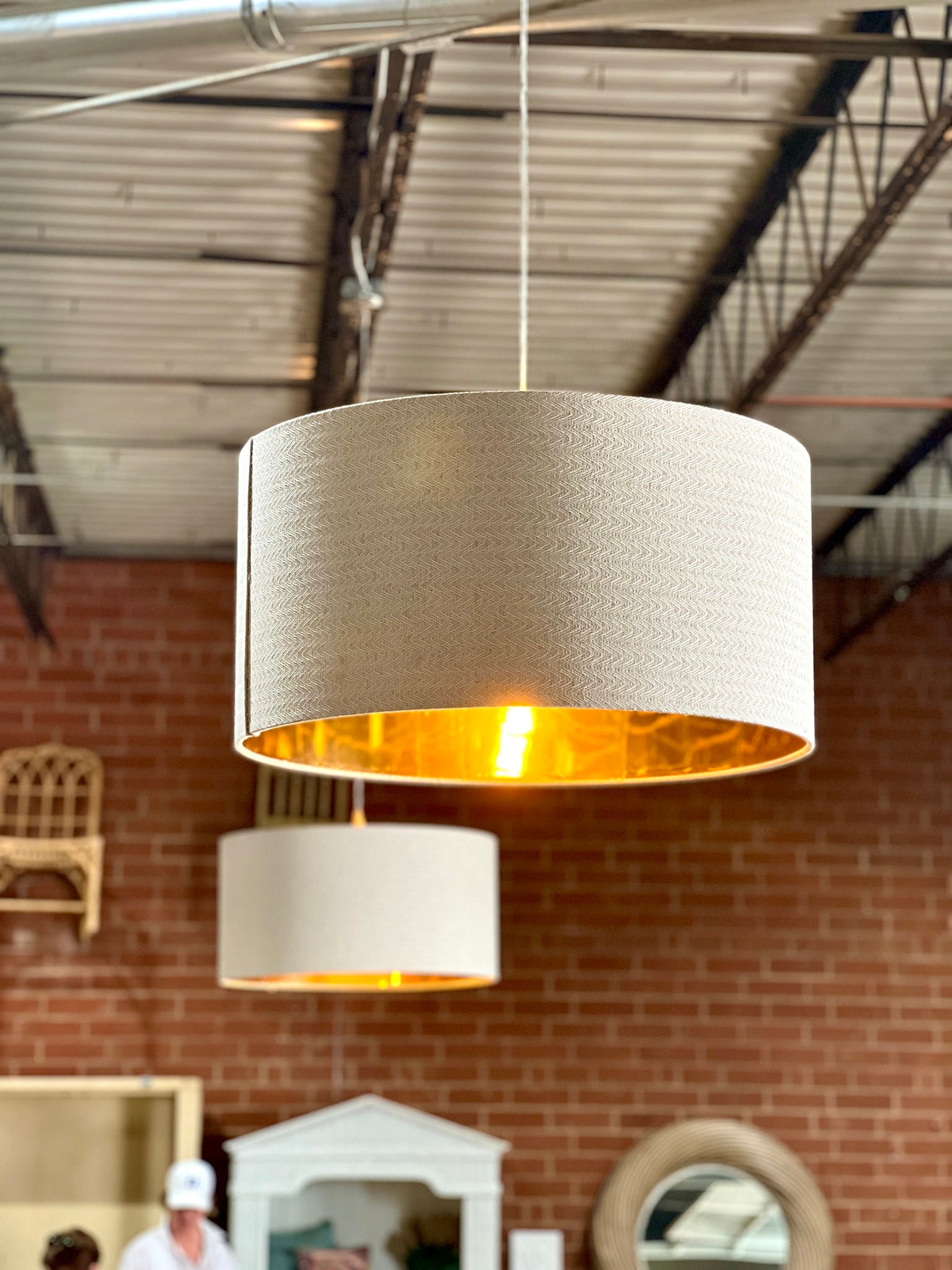 beige drumshades hung on ceilings