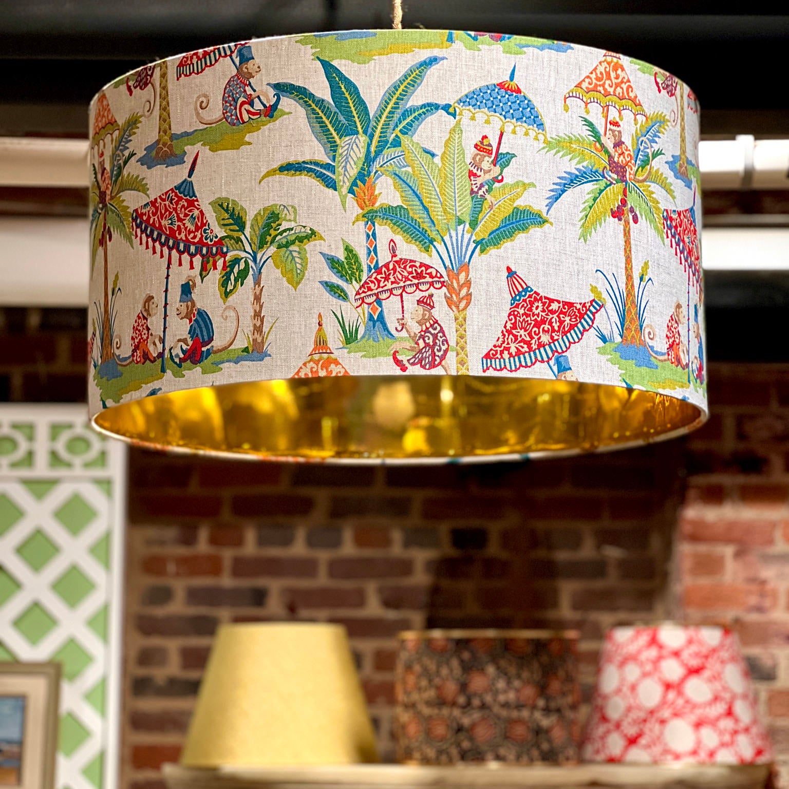 closeup of monkey fabric lampshade that's hung up