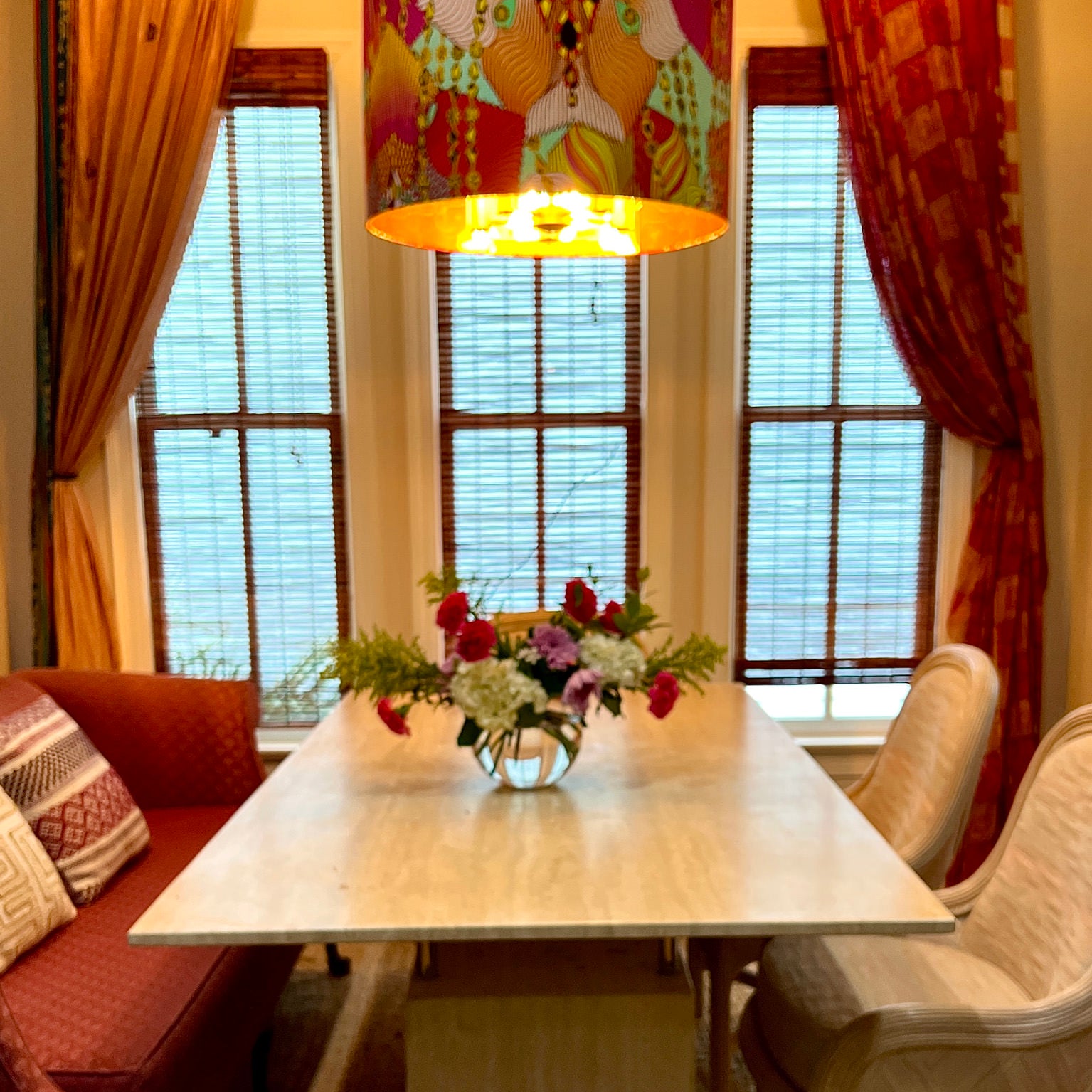 kitchen table, curtains and drum lampshade hung