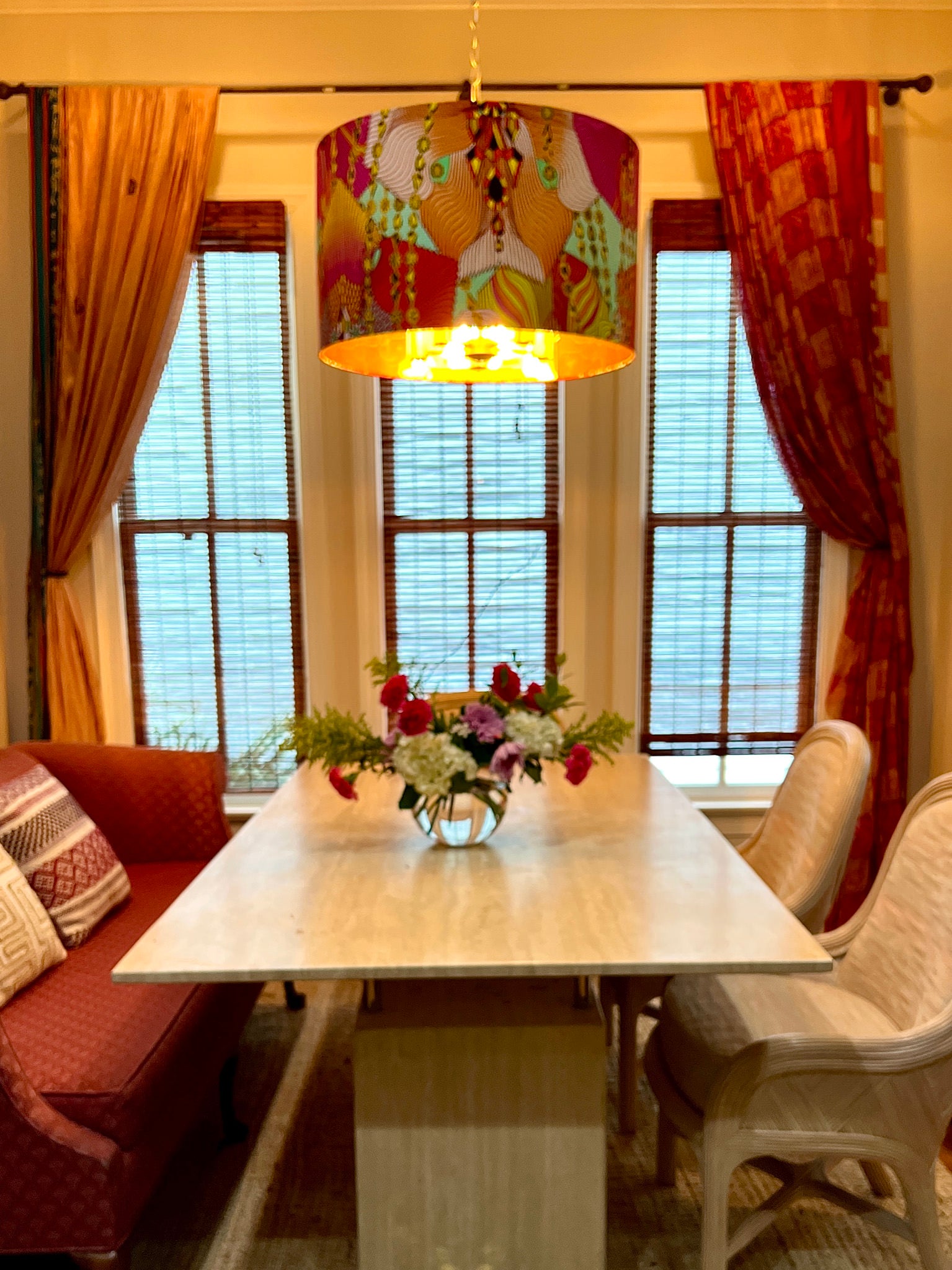 kitchen table, curtains and drum lampshade hung