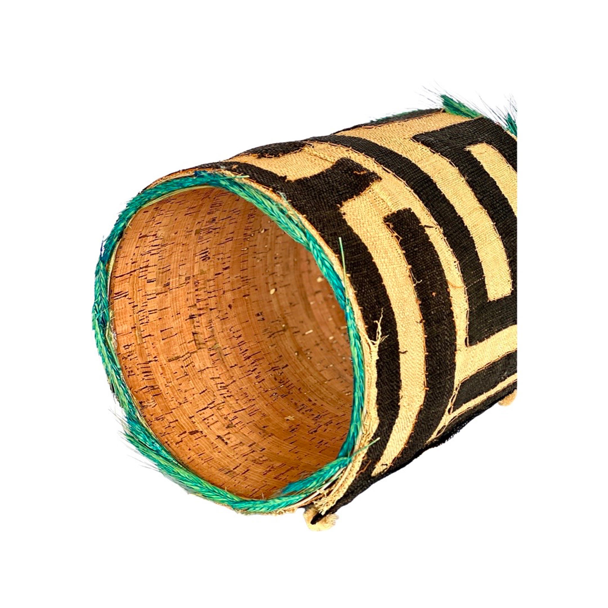 black and light brown lampshade with blue/green piping