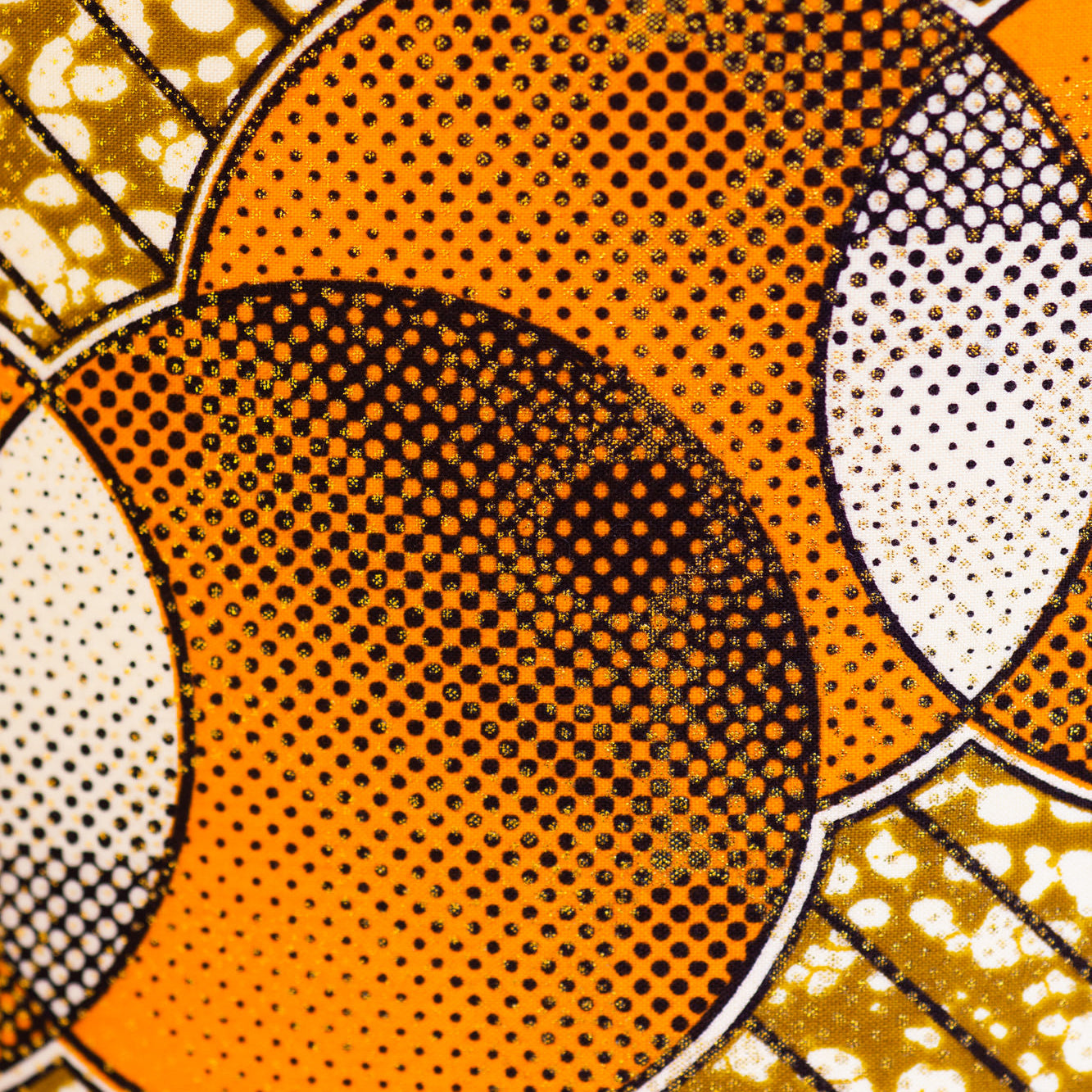 orange, brown and black design fabric