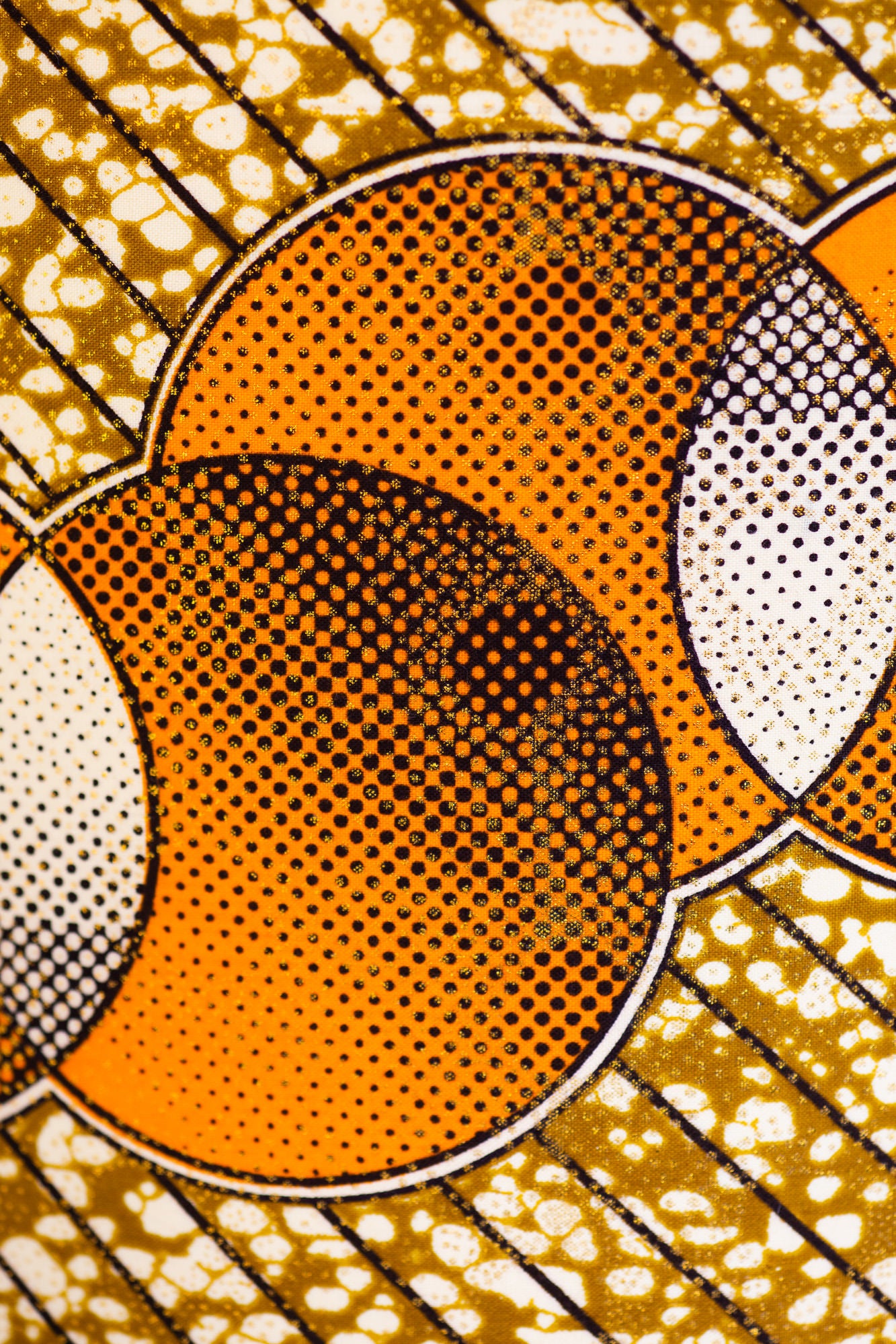 orange, brown and black design fabric