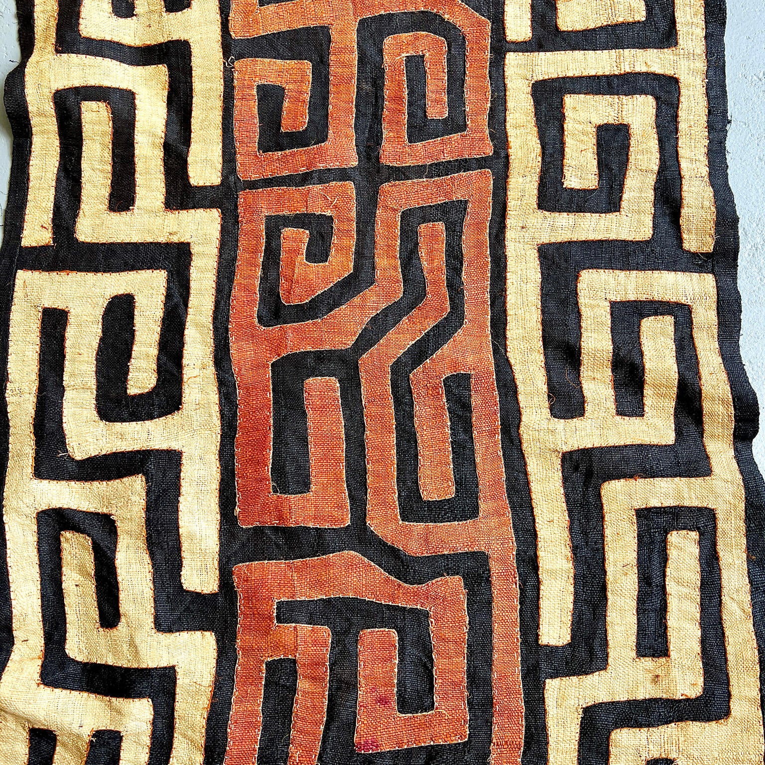 beige, black, dark orange kuba cloth