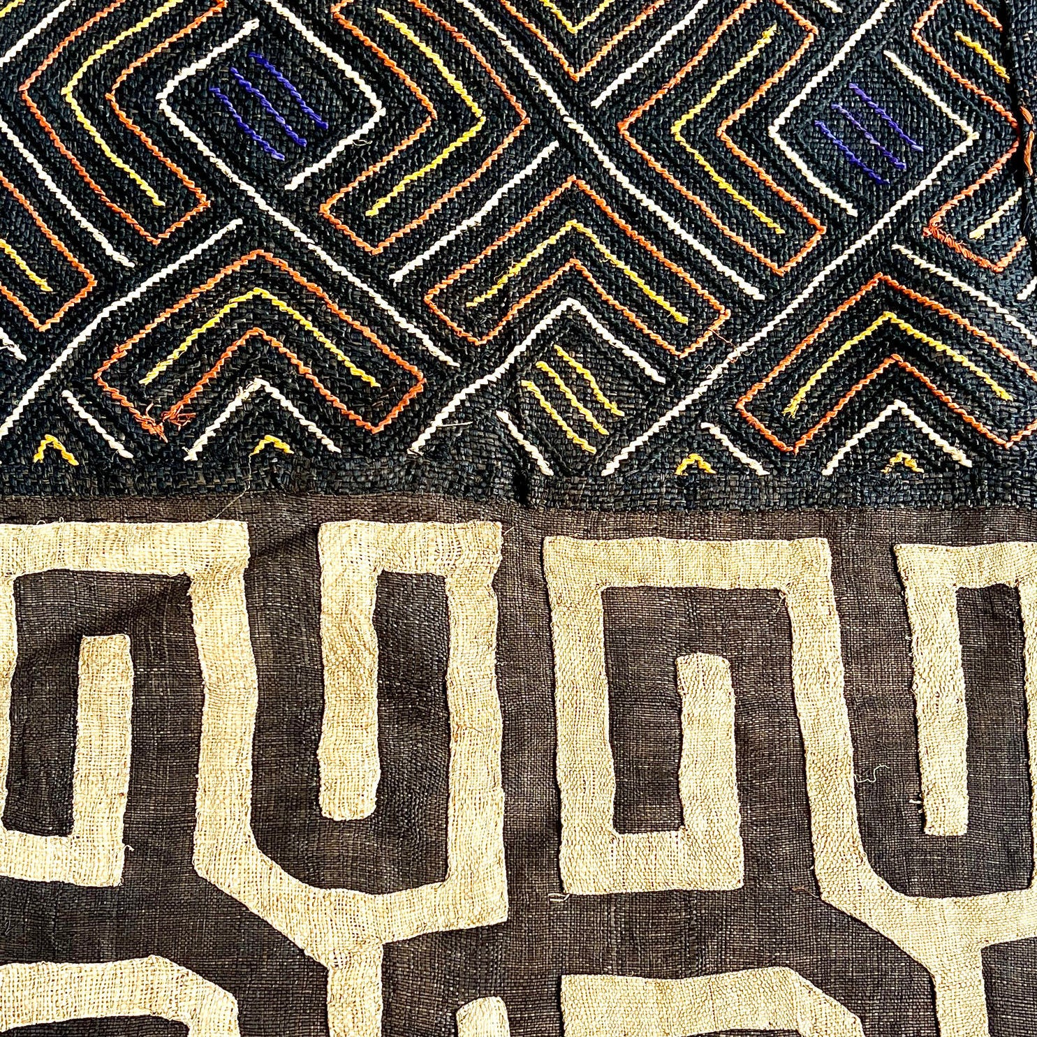 black, dark brown, beige, and blue/purple kuba cloth