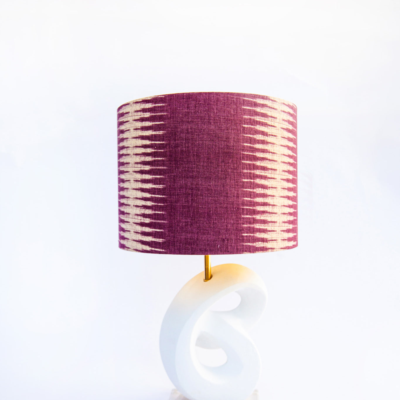 pink drum lampshade and white lamp