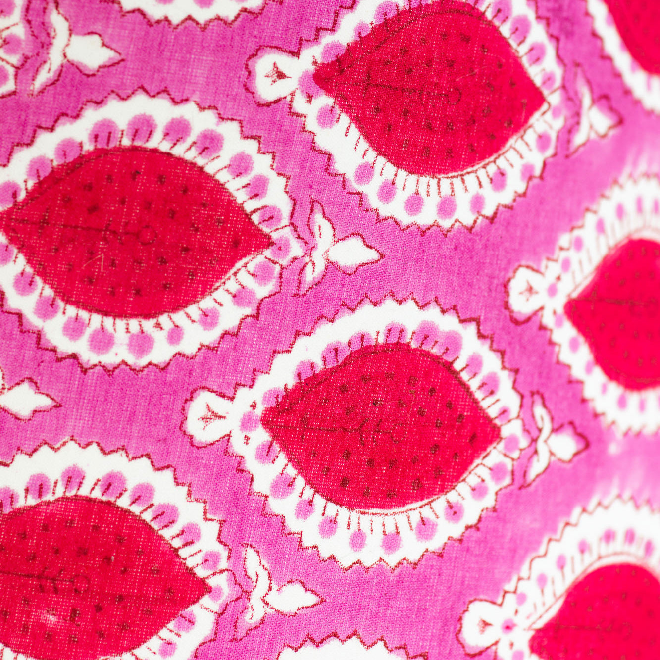 red, pink and white designed fabric