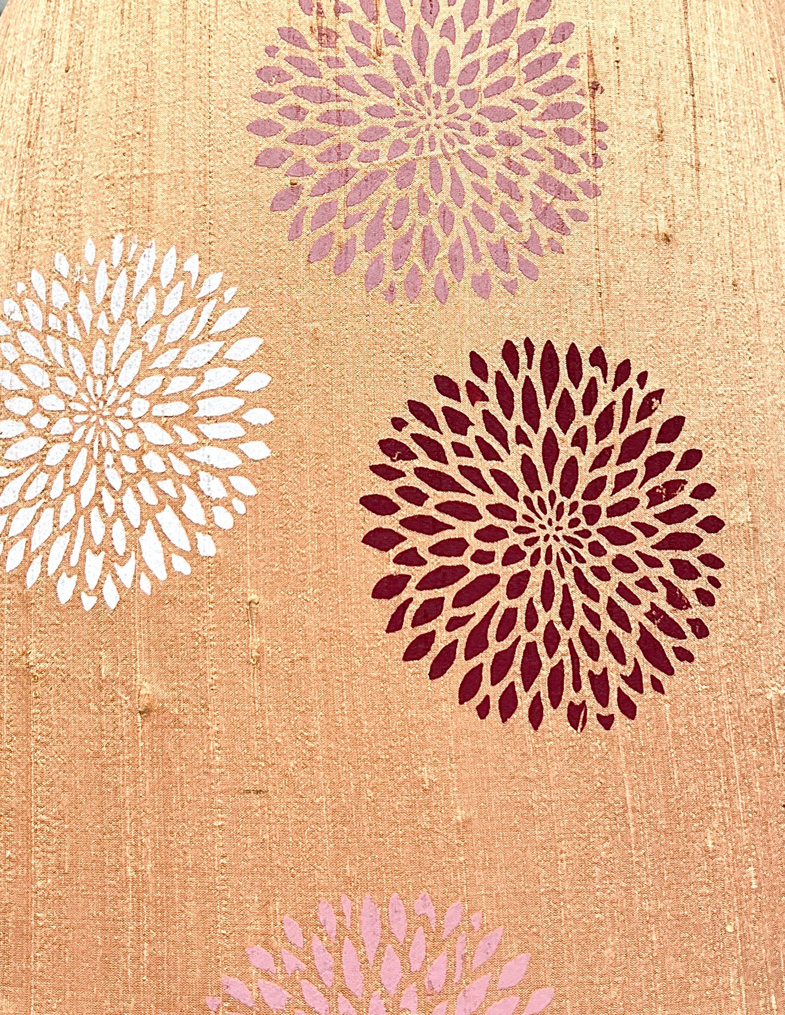 white, brown, pink and indigo flowers on light brown silk fabric